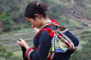 Rural Mother, Embroidering by Jim Patton