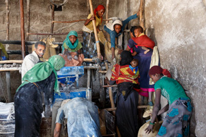 Grinding Corn and Teff by Jim Patton