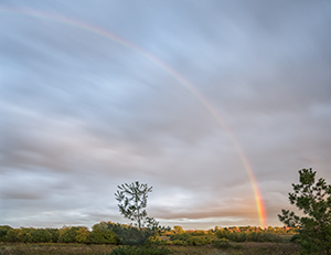 Sunset Rainbow by Carl Crumley