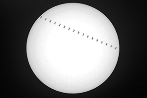 International Space Station Transits the Sun by Carl Crumley